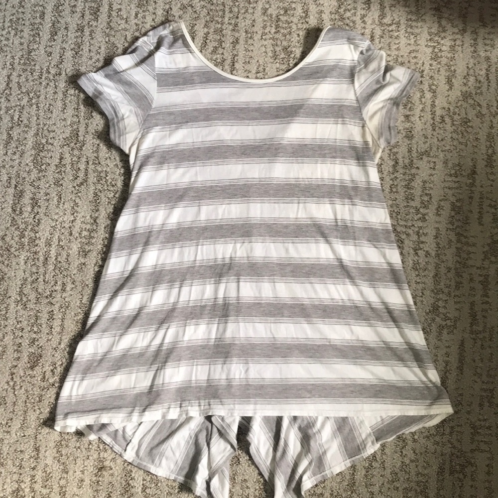Grey and white striped shirt sleeve